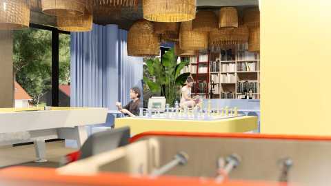 Moderne Lounge mit Schachbrett, Bücherregal, Tischfußball und zwei Frauen.