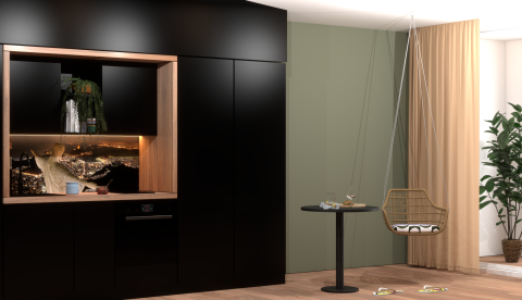 Moderne Küche mit schwarzer Schrankwand, Hängesessel und kleinem Tisch.